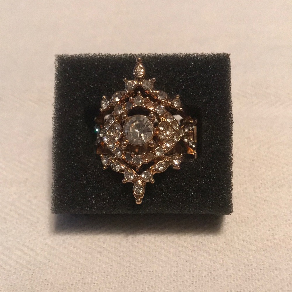 Stunning Rose Gold Ring with Clear Sparkling Stones.
